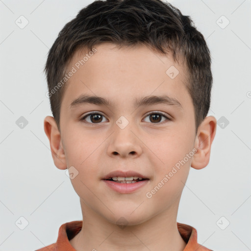 Joyful white child male with short  brown hair and brown eyes