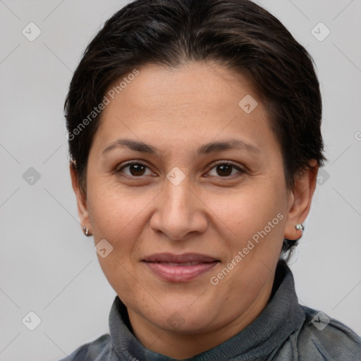 Joyful white adult female with short  brown hair and brown eyes