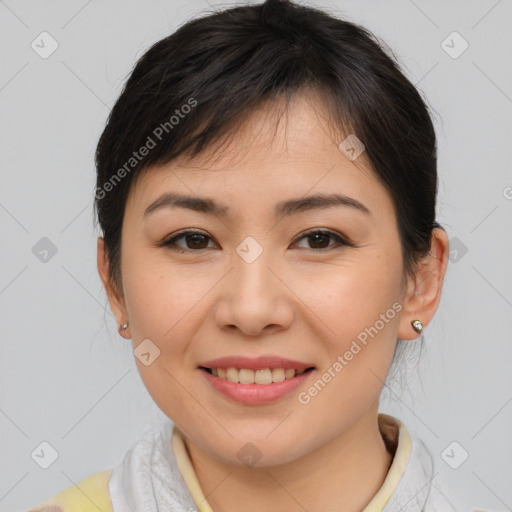 Joyful asian young-adult female with medium  brown hair and brown eyes