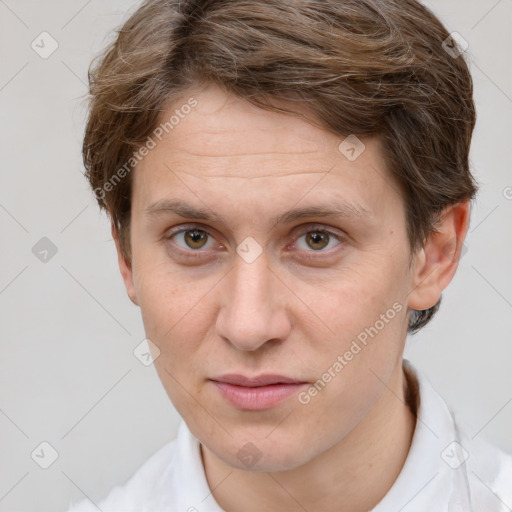 Joyful white adult male with short  brown hair and grey eyes