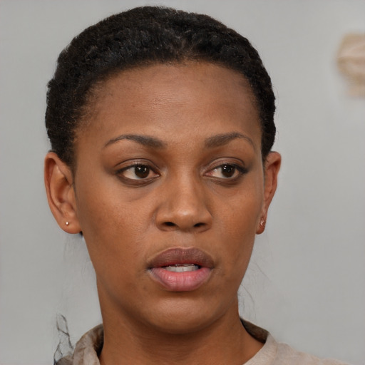 Neutral black young-adult female with short  brown hair and brown eyes