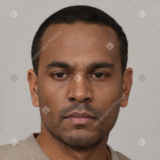Neutral latino young-adult male with short  black hair and brown eyes