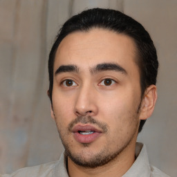 Neutral white young-adult male with short  black hair and brown eyes