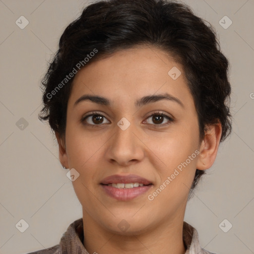 Joyful latino young-adult female with medium  brown hair and brown eyes