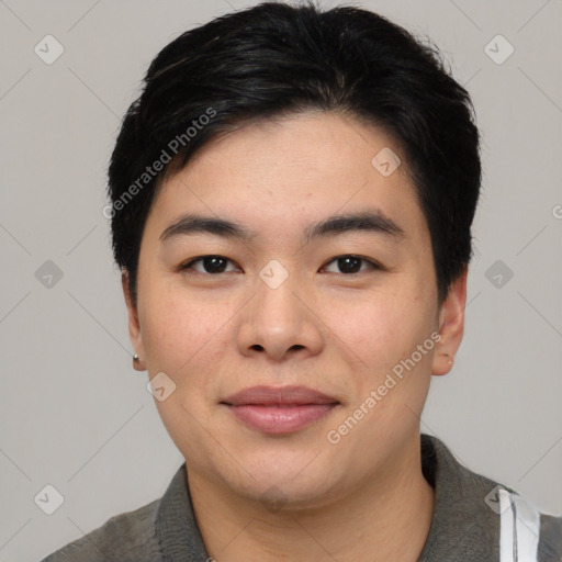 Joyful asian young-adult male with short  black hair and brown eyes