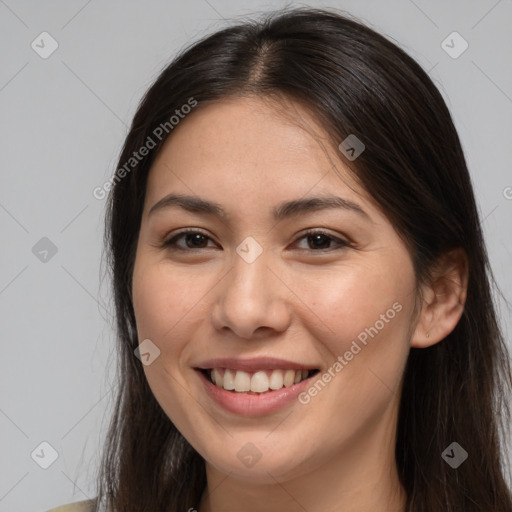 Joyful white young-adult female with long  brown hair and brown eyes