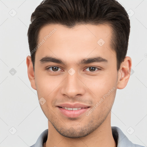 Joyful white young-adult male with short  brown hair and brown eyes