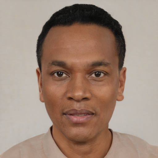 Neutral black young-adult male with short  black hair and brown eyes