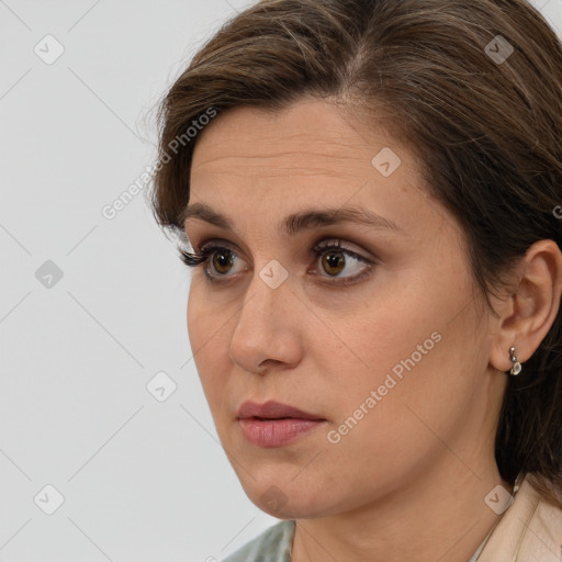 Neutral white young-adult female with medium  brown hair and brown eyes