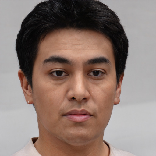 Neutral white young-adult male with short  black hair and brown eyes