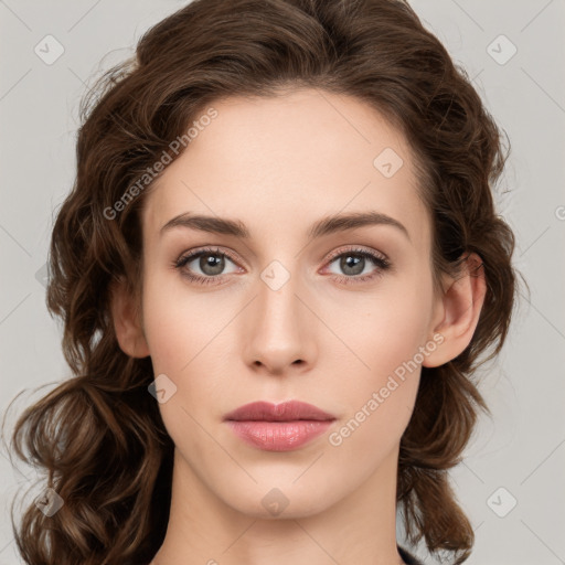 Neutral white young-adult female with medium  brown hair and green eyes