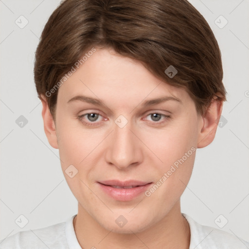 Joyful white young-adult female with short  brown hair and grey eyes