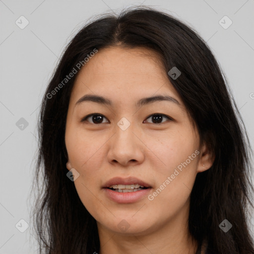 Joyful asian young-adult female with long  brown hair and brown eyes