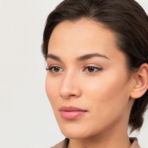 Neutral white young-adult female with medium  brown hair and brown eyes