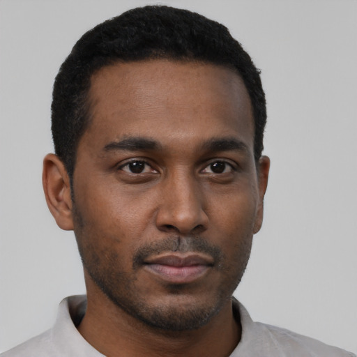 Neutral black young-adult male with short  black hair and brown eyes