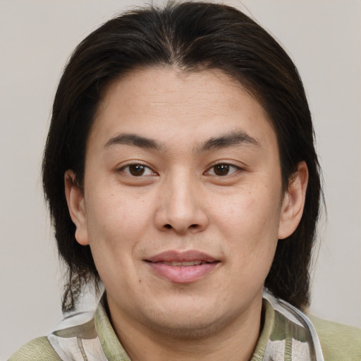 Joyful white young-adult male with medium  brown hair and brown eyes