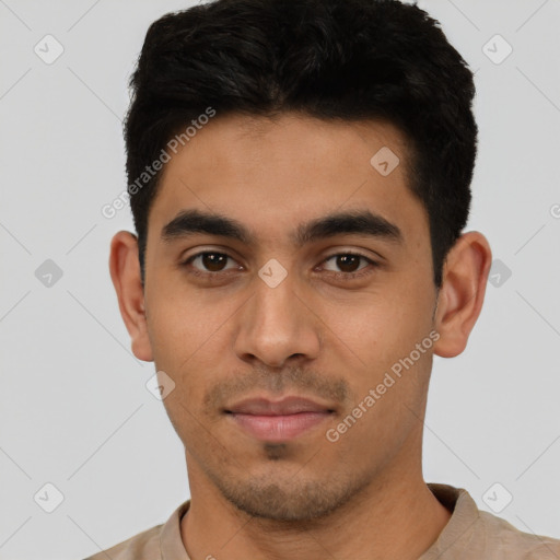 Neutral latino young-adult male with short  black hair and brown eyes