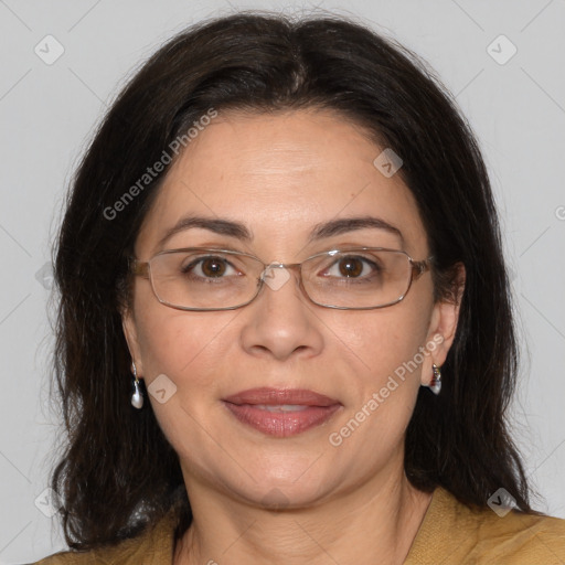 Joyful white adult female with medium  brown hair and brown eyes