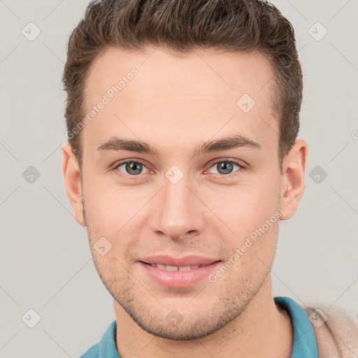 Joyful white young-adult male with short  brown hair and brown eyes