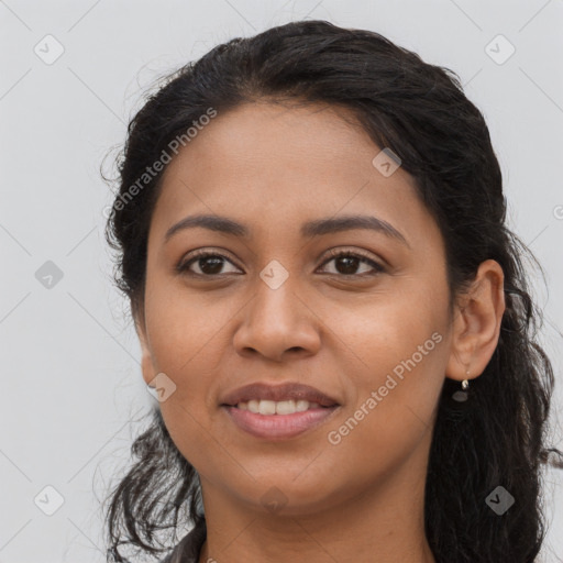 Joyful latino young-adult female with long  brown hair and brown eyes