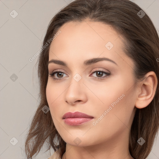 Neutral white young-adult female with long  brown hair and brown eyes