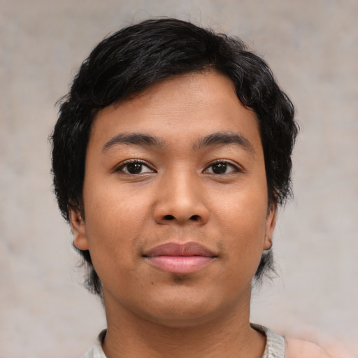 Joyful asian young-adult female with short  brown hair and brown eyes