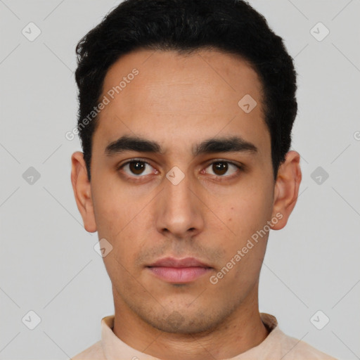 Neutral latino young-adult male with short  black hair and brown eyes