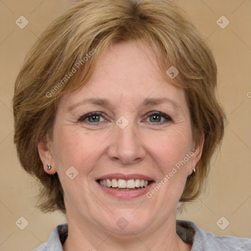 Joyful white adult female with medium  brown hair and blue eyes