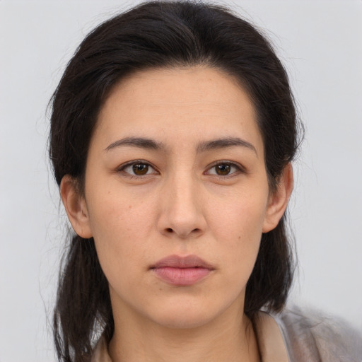 Neutral asian young-adult female with medium  brown hair and brown eyes