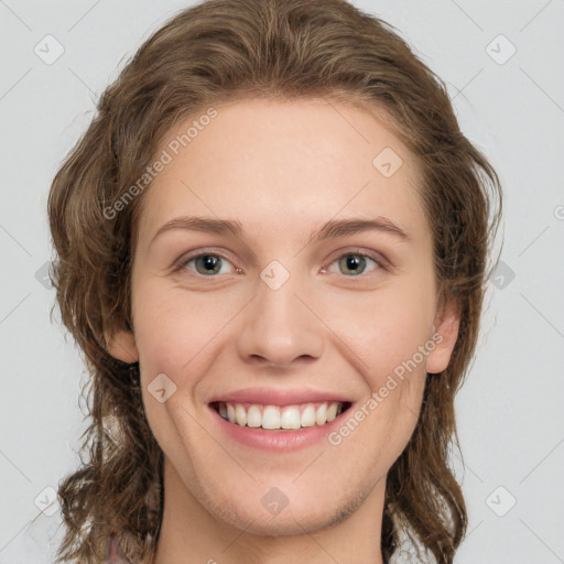 Joyful white young-adult female with medium  brown hair and green eyes