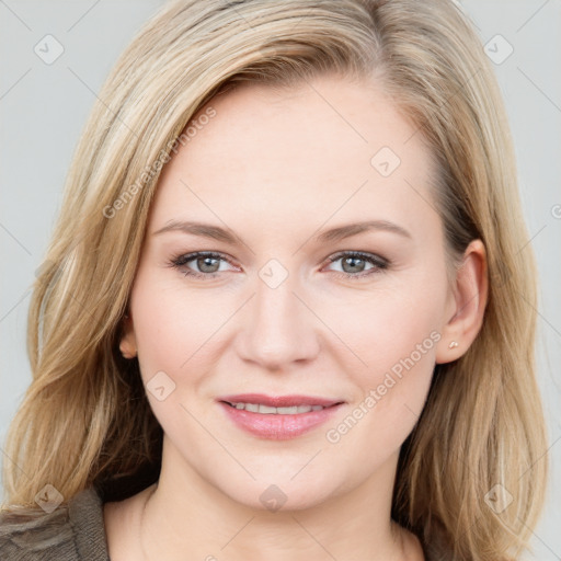 Joyful white young-adult female with medium  brown hair and blue eyes