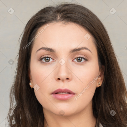 Neutral white young-adult female with long  brown hair and brown eyes