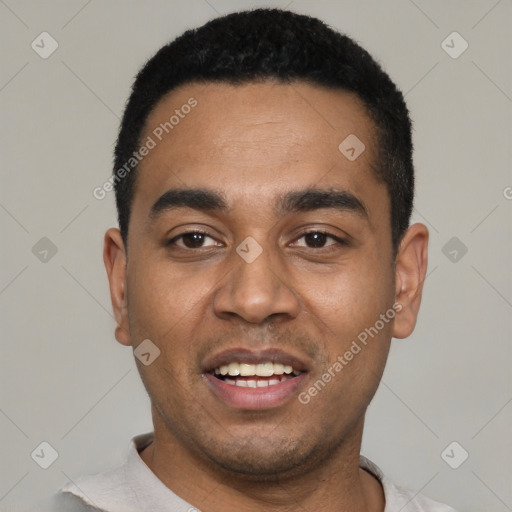 Joyful black young-adult male with short  black hair and brown eyes