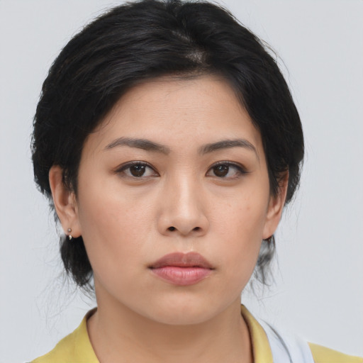 Neutral asian young-adult female with medium  black hair and brown eyes