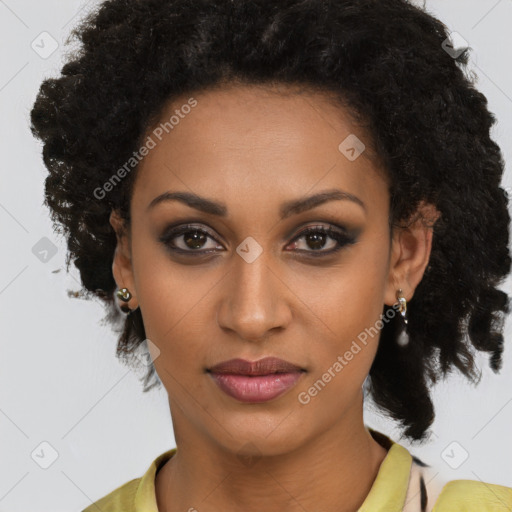 Joyful black young-adult female with medium  brown hair and brown eyes