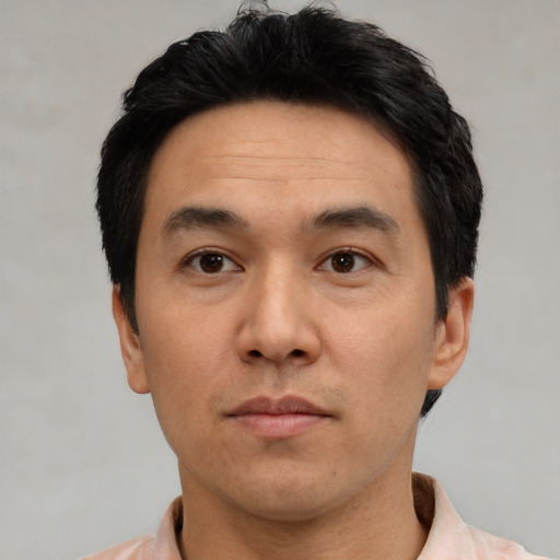 Neutral white adult male with short  black hair and brown eyes