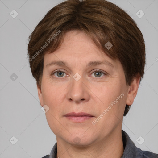 Joyful white adult male with short  brown hair and grey eyes