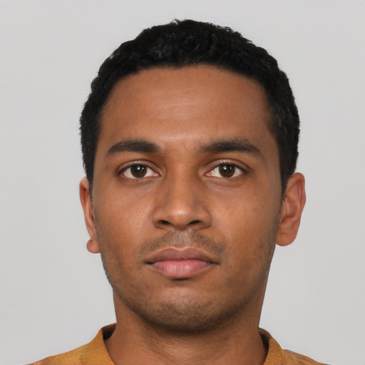 Neutral black young-adult male with short  black hair and brown eyes
