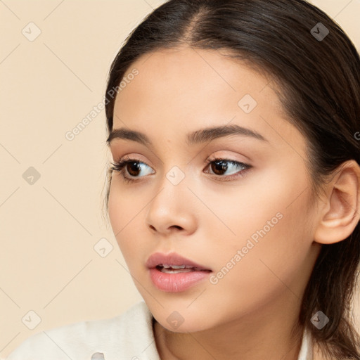 Neutral white young-adult female with long  brown hair and brown eyes