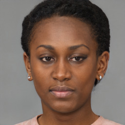 Neutral black young-adult female with short  brown hair and brown eyes