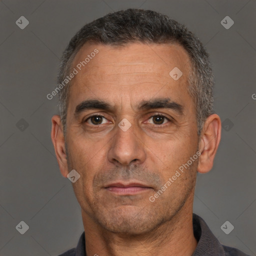 Neutral white adult male with short  brown hair and brown eyes