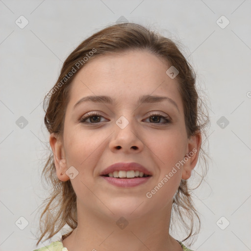 Joyful white young-adult female with medium  brown hair and grey eyes