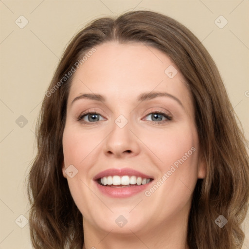 Joyful white young-adult female with long  brown hair and green eyes