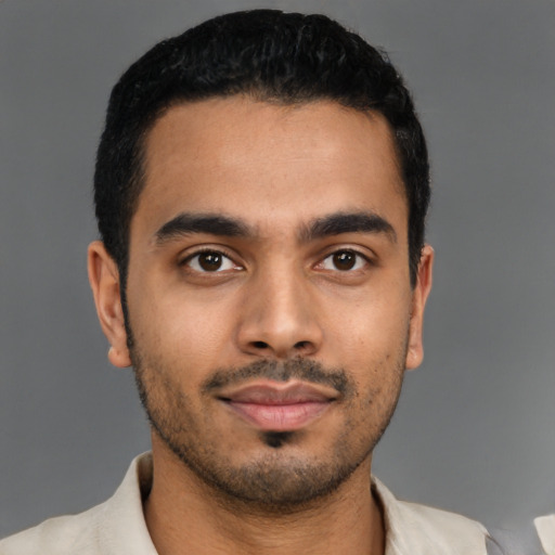 Neutral latino young-adult male with short  black hair and brown eyes