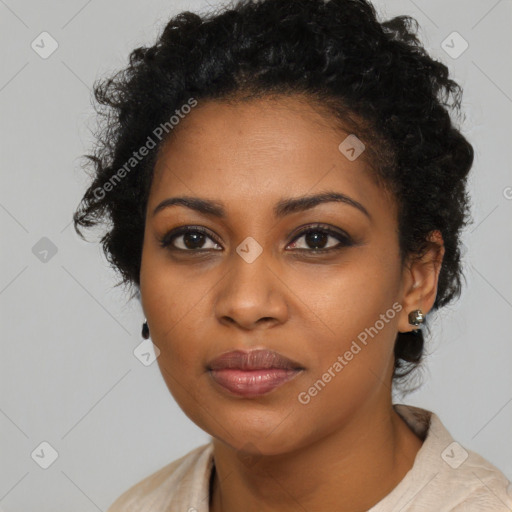 Joyful black young-adult female with long  brown hair and brown eyes