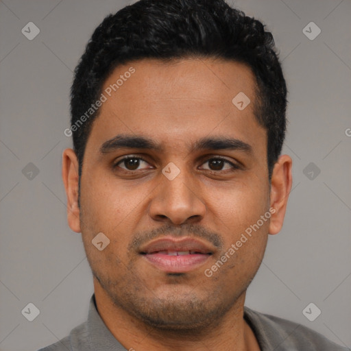 Joyful latino young-adult male with short  black hair and brown eyes