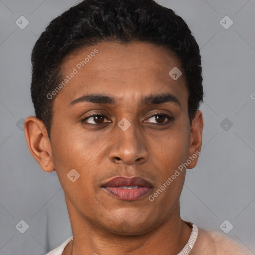 Joyful latino young-adult male with short  brown hair and brown eyes