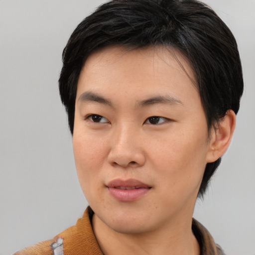Neutral asian young-adult female with short  brown hair and brown eyes