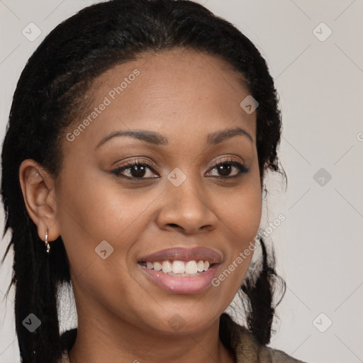 Joyful black young-adult female with long  brown hair and brown eyes