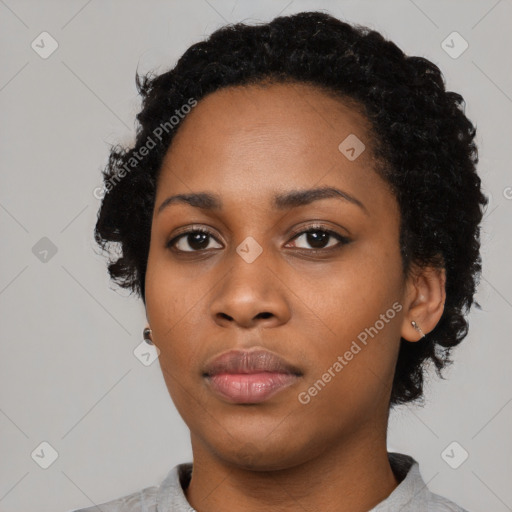 Neutral black young-adult female with short  black hair and brown eyes